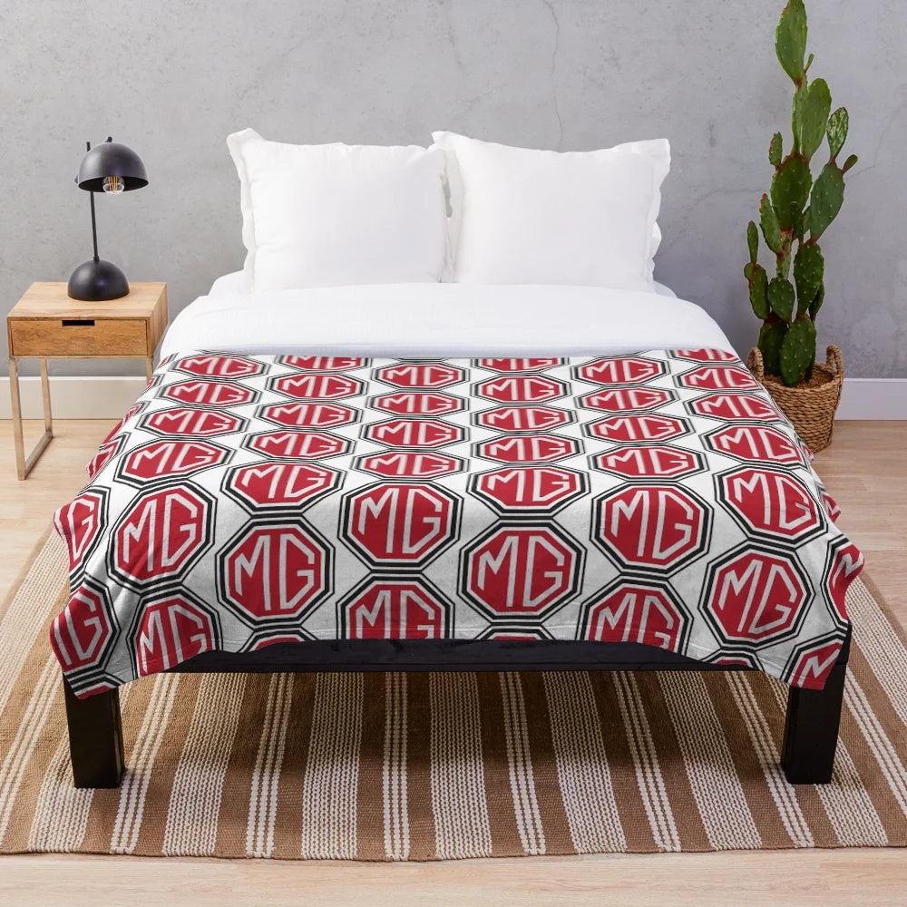 Vintage-inspired MG logo plush blanket for classic car enthusiasts