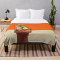 Vintage-inspired plush blanket with a surreal, pop art-influenced floral design