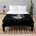 Soft, cozy plush blanket with a vintage-inspired moon design