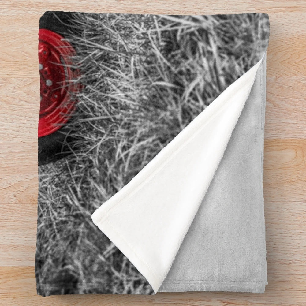 Vintage-inspired red tractor plush blanket