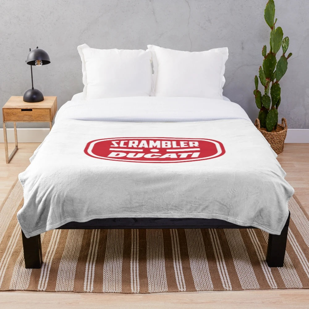 Cozy plush blanket featuring the iconic Scrambler Ducati motorcycle logo