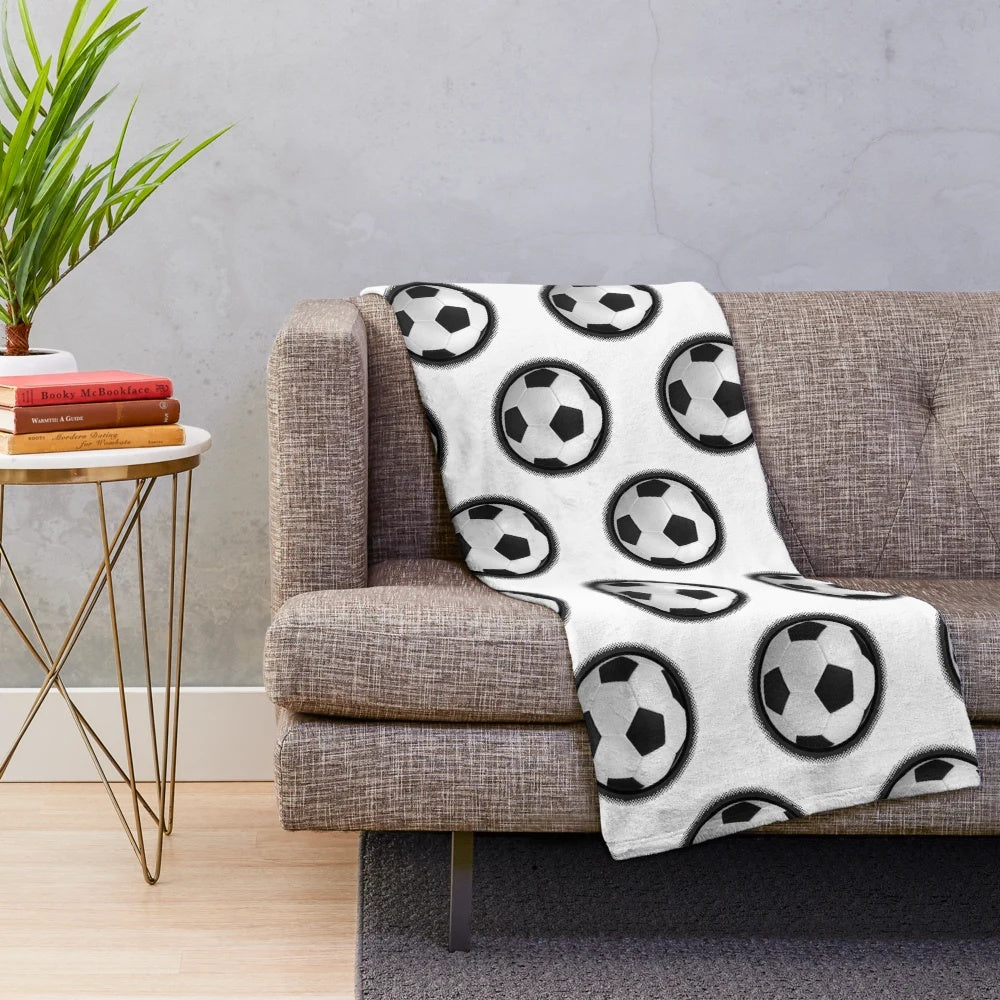 Soft and cozy soccer-themed plush blanket with a vintage halftone design