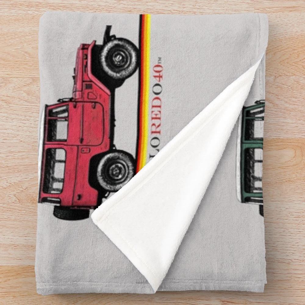 Vintage-inspired Toyota FJ40 Land Cruiser plush blanket with hand-drawn design