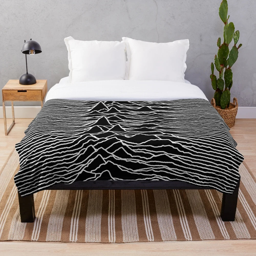 Plush blanket featuring the iconic Unknown Pleasures album cover by Joy Division
