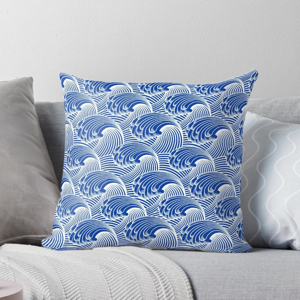 Vintage-inspired throw pillow featuring a stylized Japanese wave pattern in deep cobalt blue and white.