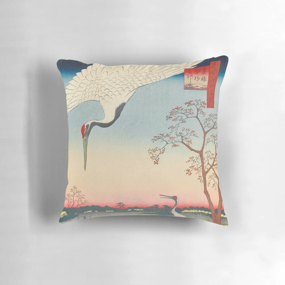 Vintage Japanese Ukiyo-e style illustration of a red-crowned crane in flight over a peaceful winter landscape