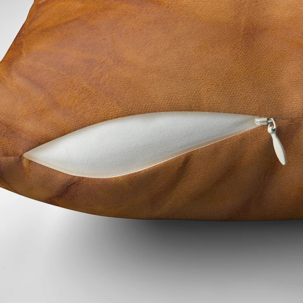 Vintage leather textured pillow with abstract animal-inspired design