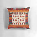 Vibrant, Bohemian-inspired Moroccan-style pillow in autumn colors and vintage fabric patterns.