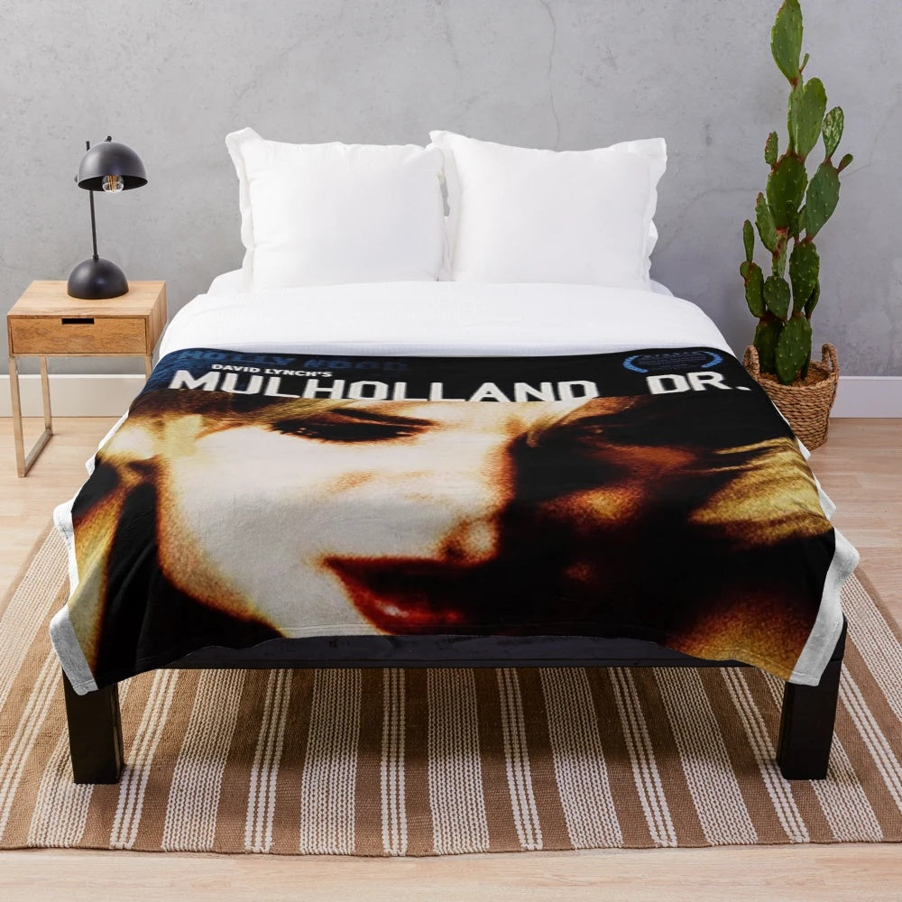 Vintage cinema-inspired plush blanket with movie poster design