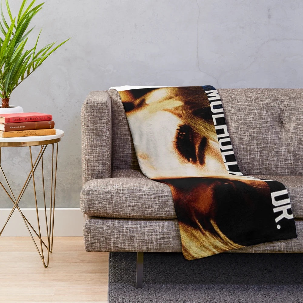 Vintage cinema-inspired plush blanket with movie poster design