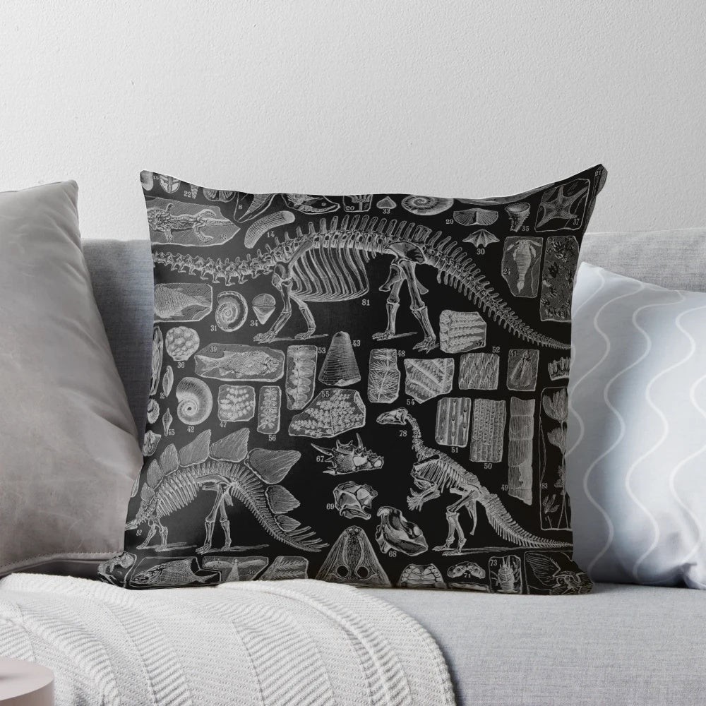 Vintage-style paleontology fossil chart illustration printed on a throw pillow featuring prehistoric dinosaur bones and skeletons.