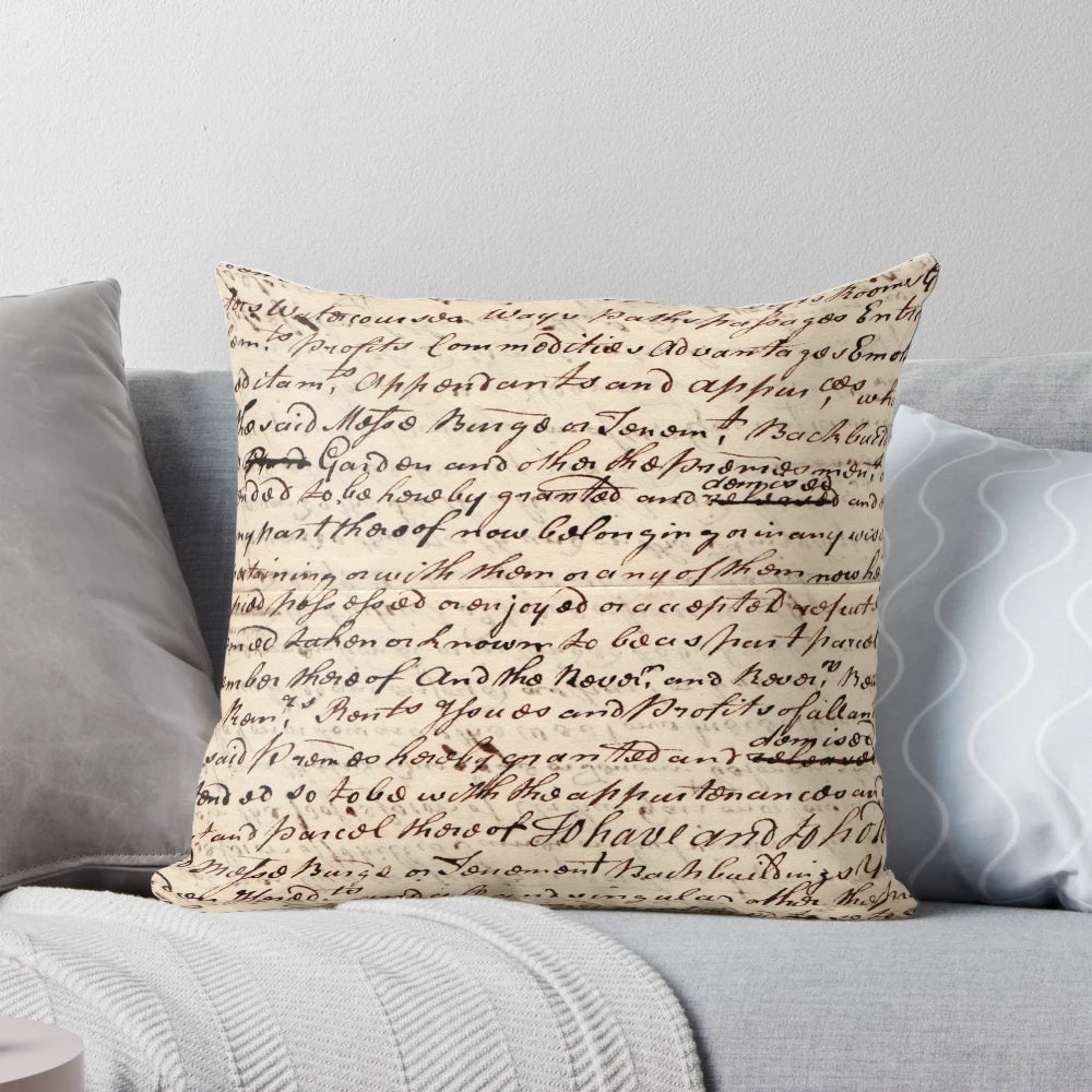A vintage-style letter pillow with a handwritten calligraphy design, perfect for dark academia home decor.