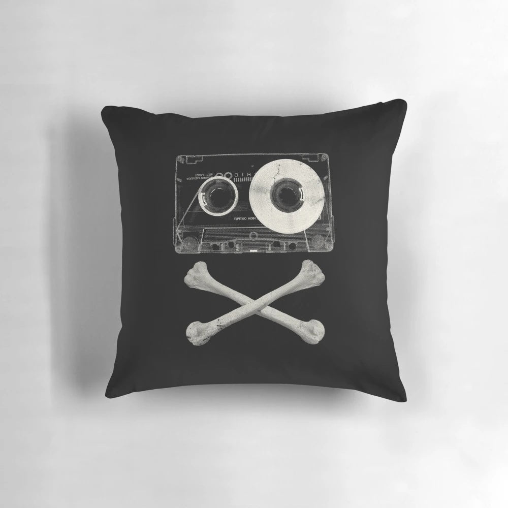 Vintage pirate music pillow with skull, tape, and cassette design