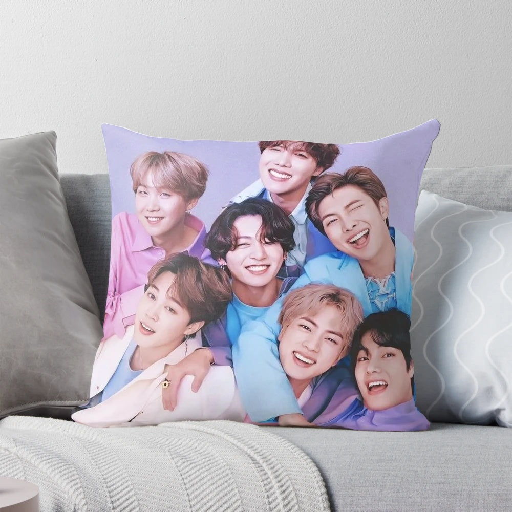 A vintage-inspired decorative pillow featuring the members of the popular K-pop group BTS.