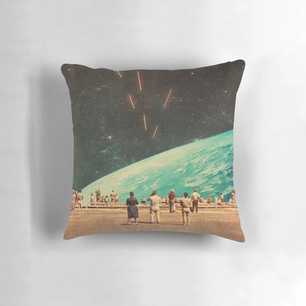 A vintage, surreal-inspired pillow featuring a collage of people, planets, and celestial elements for an otherworldly, sci-fi inspired home decor touch.