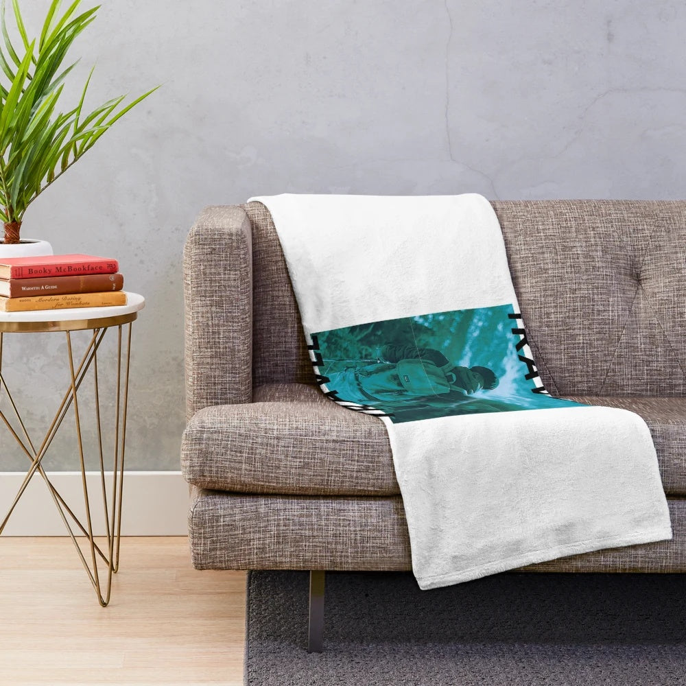 Vintage travel-inspired plush blanket featuring distressed mountain scenery