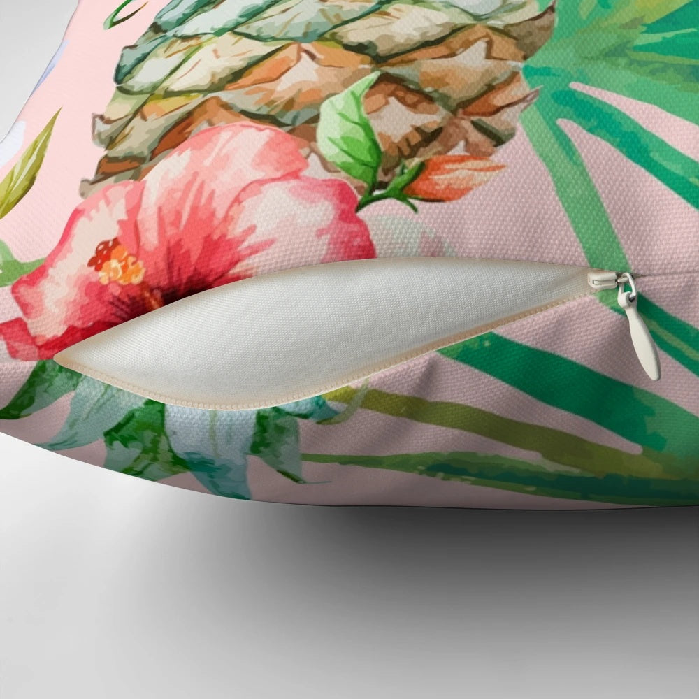 A vintage-inspired tropical botanical pillow featuring a watercolor painting of pineapples, palm leaves, and a blush color palette.