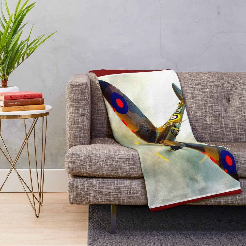 Vintage inspired plush blanket featuring a colorful abstract design of a WWII Spitfire fighter plane