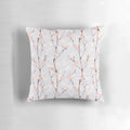 A Pillow showcasing a watercolor floral blossom seamless pattern.
