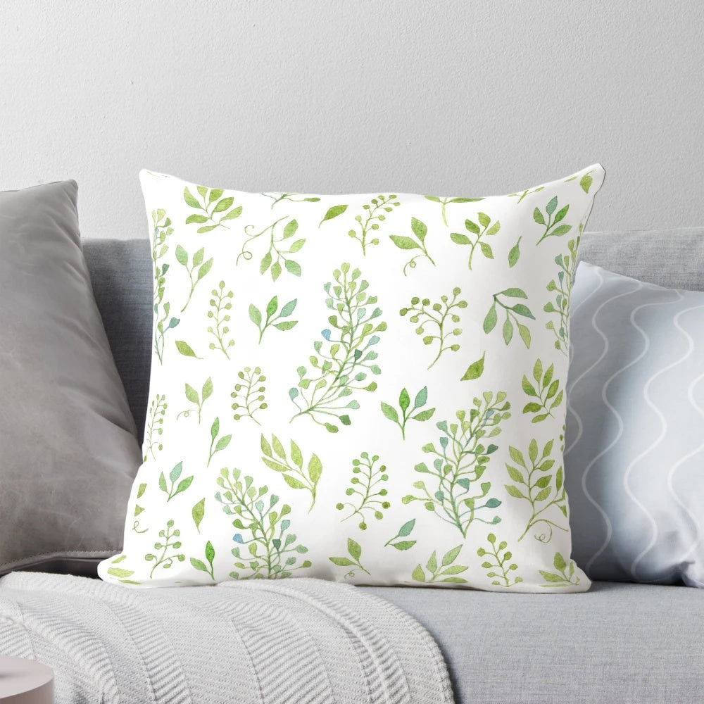 Watercolor leaves pattern throw pillow featuring a hand-drawn design of branches and leaves in a seamless, natural background.