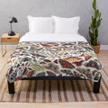 Watercolor moths of North America pattern on a plush blanket