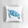 Vibrant watercolor image of a sea turtle on a plush, coastal-inspired pillow.