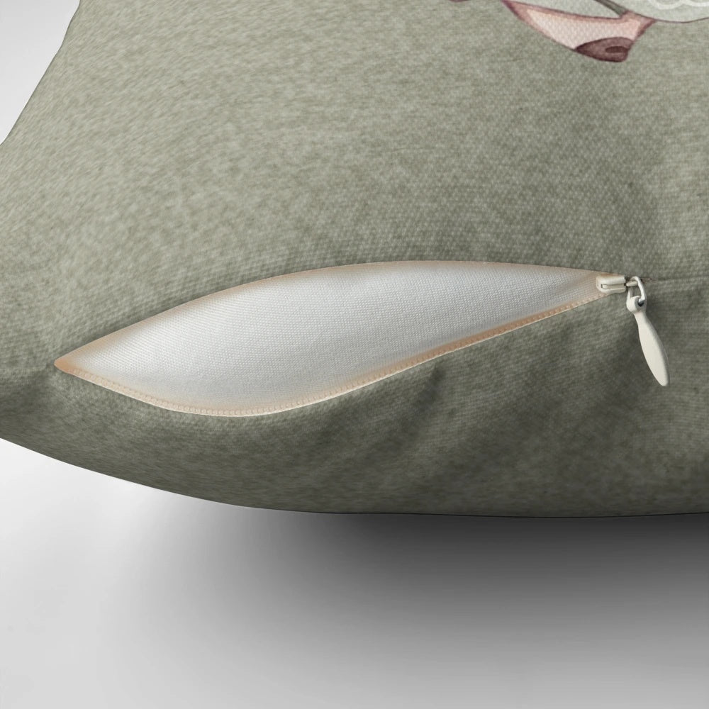 A soft, plush pillow featuring a cute mushroom design surrounded by delicate flowers in pastel colors, perfect for a cozy, fairytale-inspired home.