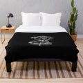 Plush blanket featuring a whimsical and abstract design of a butterfly and a cow