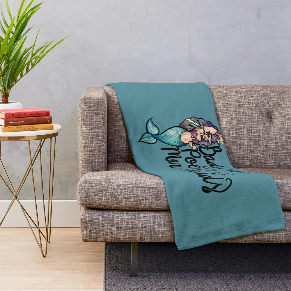 Soft and cozy plush mermaid blanket with whimsical mermaid design