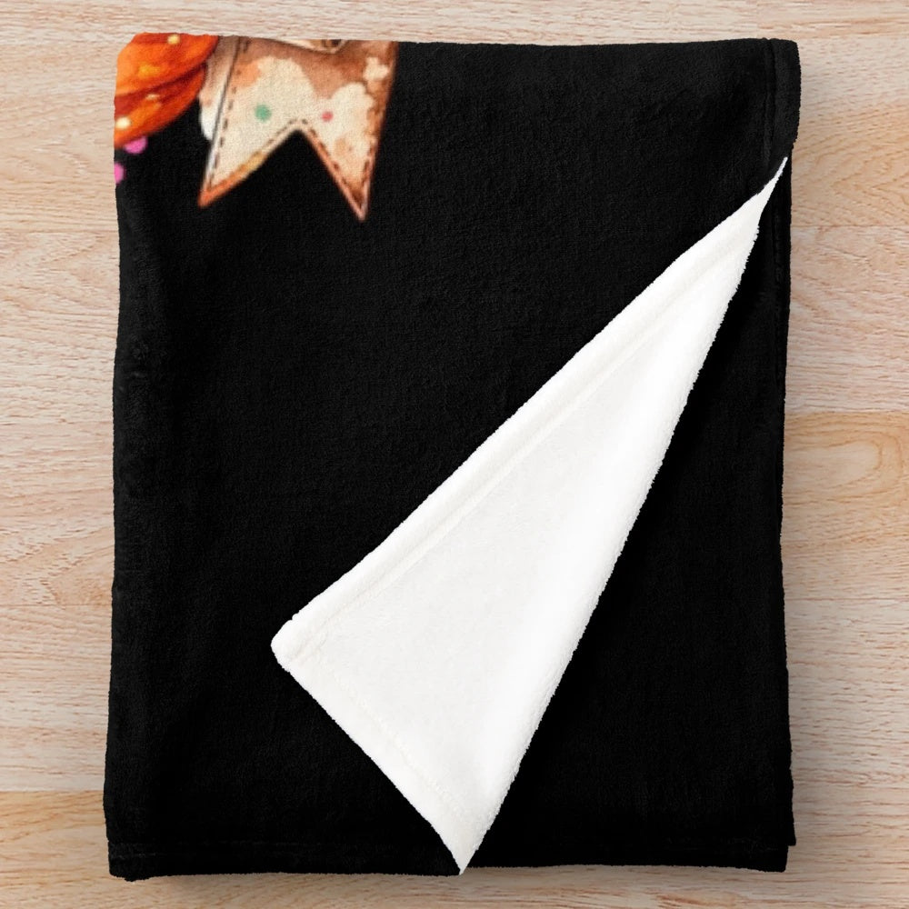 Whimsical watercolor pumpkin illustration on a cozy plush blanket for fall decor
